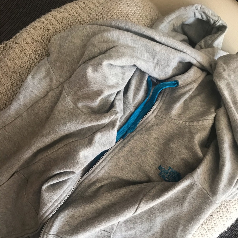 Grey and blue North face zip up hoodie